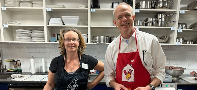 BOD member Lon making a meal for families his wife Teresa.