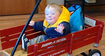 Toddler sitting in wagon