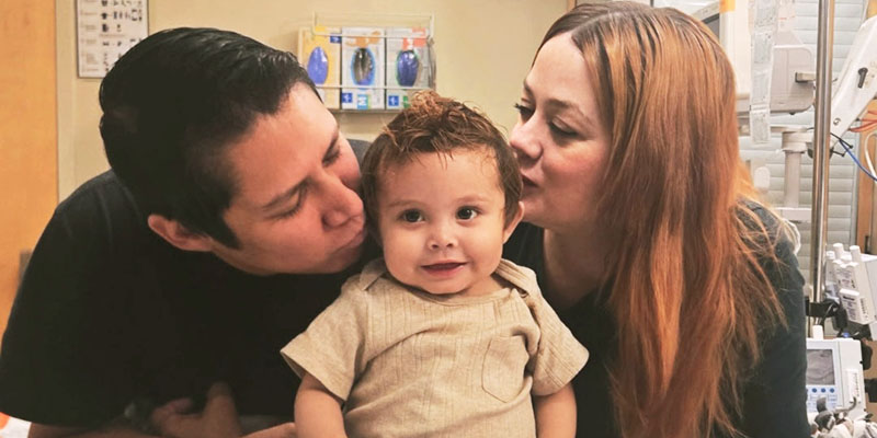 dad and mom kissing sonny